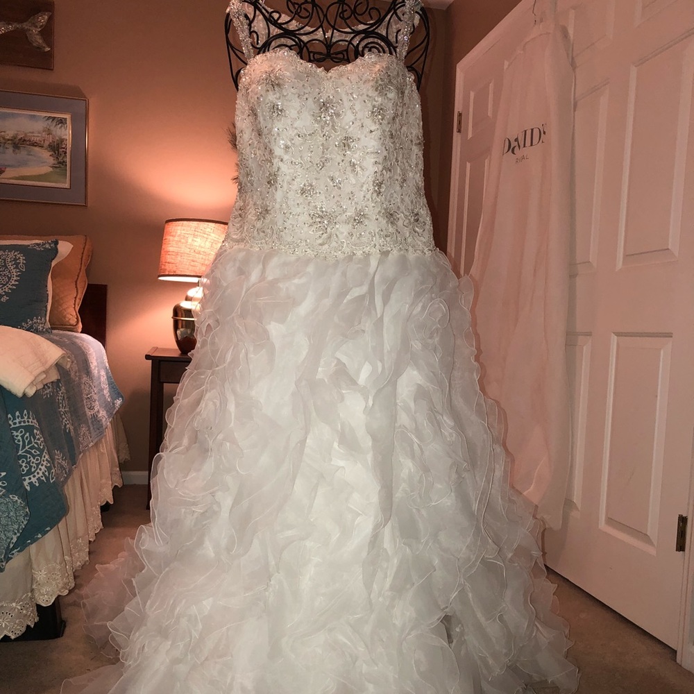 Never worn Size 18 wedding dress.